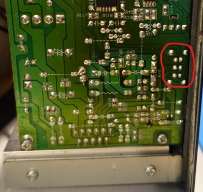 bottom of circuit board with switch location circled